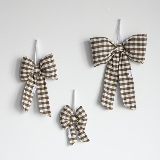 Beige gingham bows by Luxe B Co featuring olive green accents, perfect for hair accessories or decorative accents.