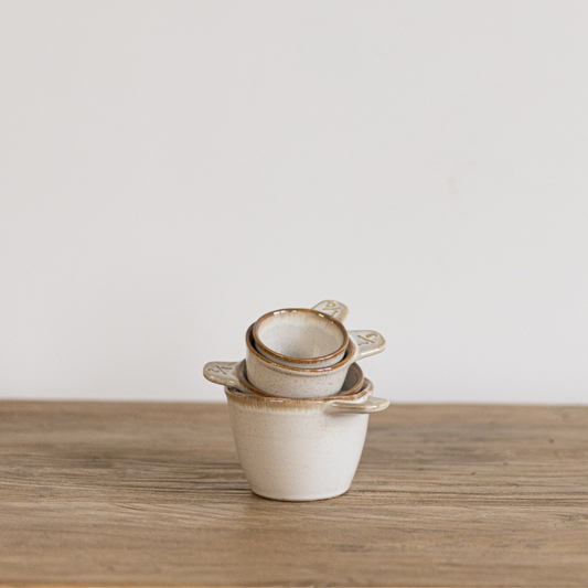 Decorative ceramic measuring cups by Luxe B Co, featuring a stylish design perfect for kitchen or display use.