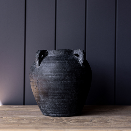 Charcoal-colored Luxe B Co quad handle vase with a sleek, modern design and four sturdy handles for decorative display.