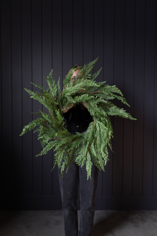 Luxe B Co 24-inch Cypress Leaf Full Real Touch Wreath with lush, realistic green foliage for decorative use.