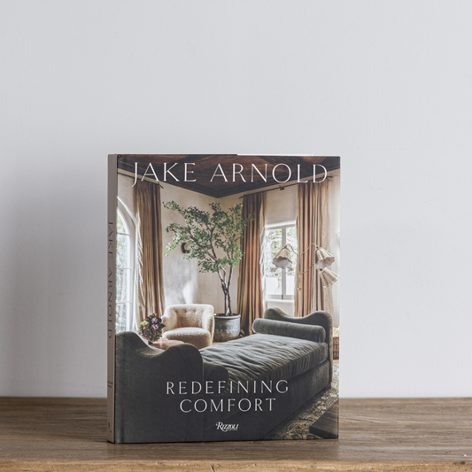 Jake Arnold coffee table book by Luxe B Co featuring stylish interior design photography and elegant cover design.