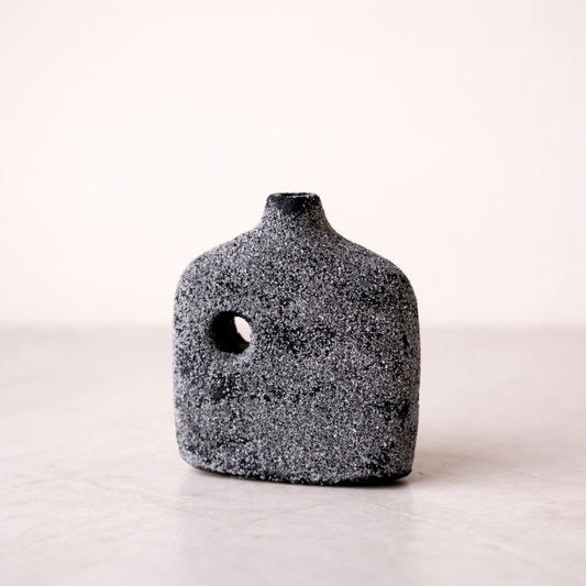 Black terracotta Milos Vase by Luxe B Co with a smooth, rounded shape and matte finish, perfect for modern home decor.