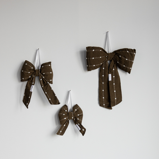 Olive green and white dotted stripe bows by Luxe B Co, featuring stylish, fabric bows with a playful dotted pattern.