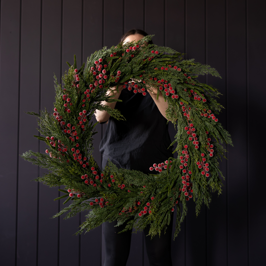 Red plum and frosted berry Norfolk Cypress real touch wreath, 34-inch, by Luxe B Co, showcasing vibrant berries and greenery.