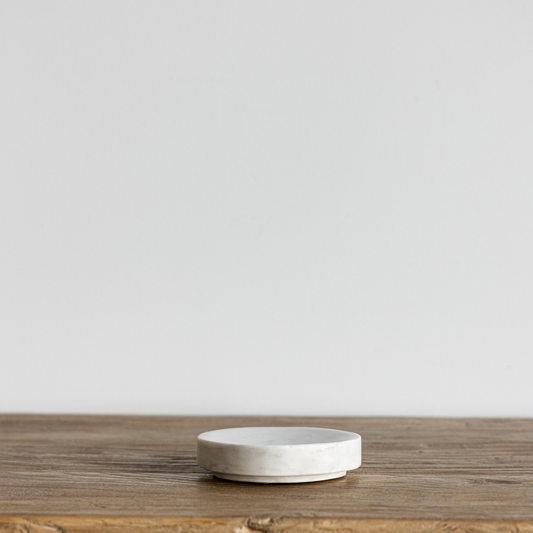 Round marble stoneware soap dish by Creative Co-op with smooth, polished surface and circular shape for bathroom or kitchen use.