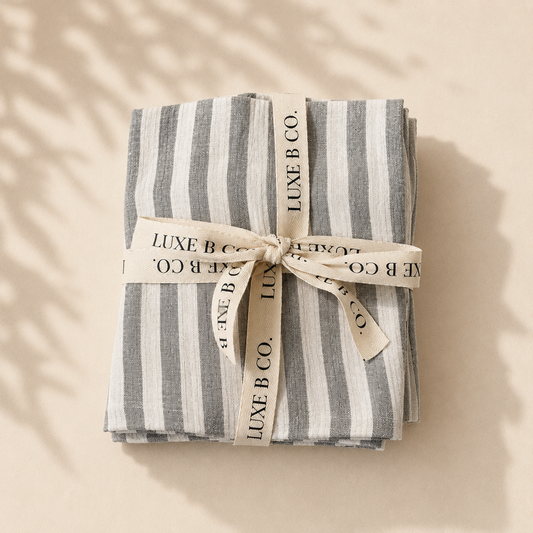 Soft green striped linen dish towel set by Luxe B Co, featuring durable, elegant fabric perfect for kitchen use.