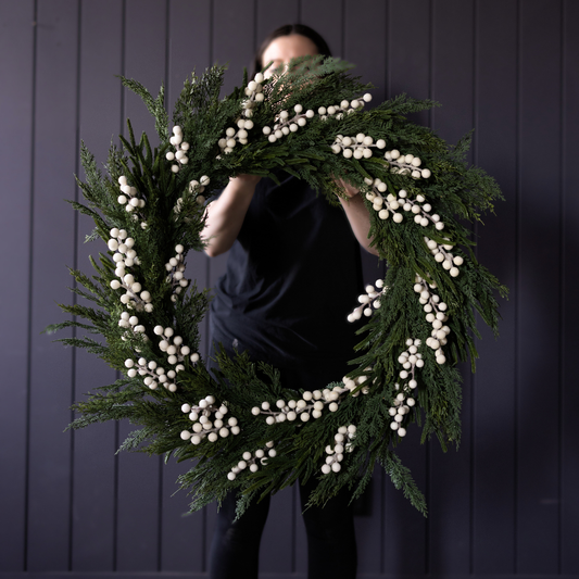 White Plum Frosted Berry Norfolk Cypress real touch wreath, 34-inch, featuring white plums, frosted berries, and green cypress branches.