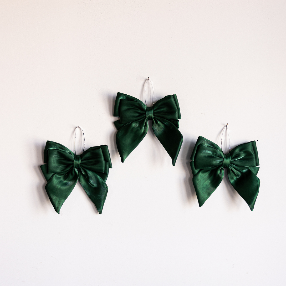 Emerald green gauze bow from Luxe B Co with a bold, stylish design perfect for accessories or gift wrapping.
