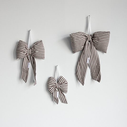 Striped brown fabric bows by Luxe B Co, featuring classic design and soft material, perfect for gift wrapping or decorative accents.