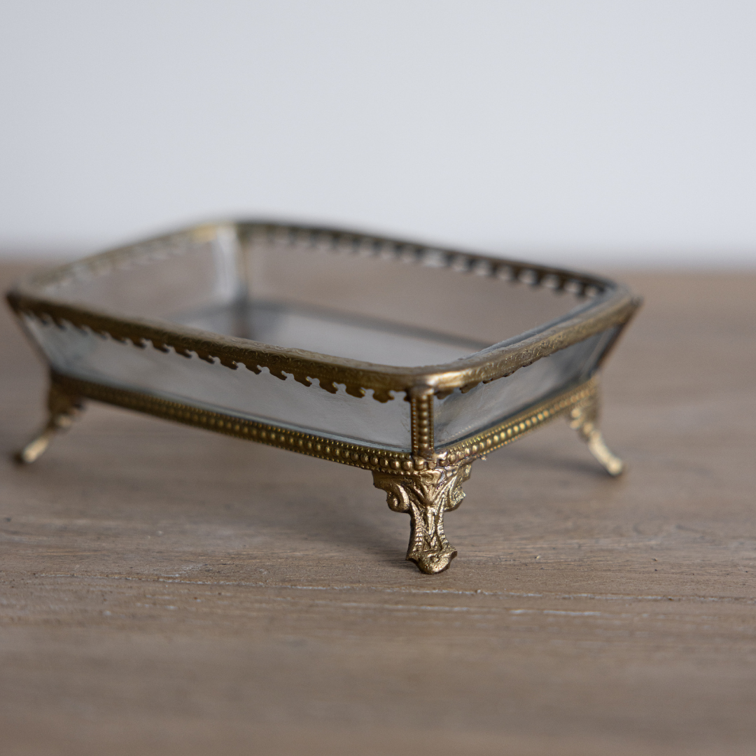 Antique-inspired metal soap dish with footed design by Luxe B Co, featuring a vintage style and decorative metal detailing.
