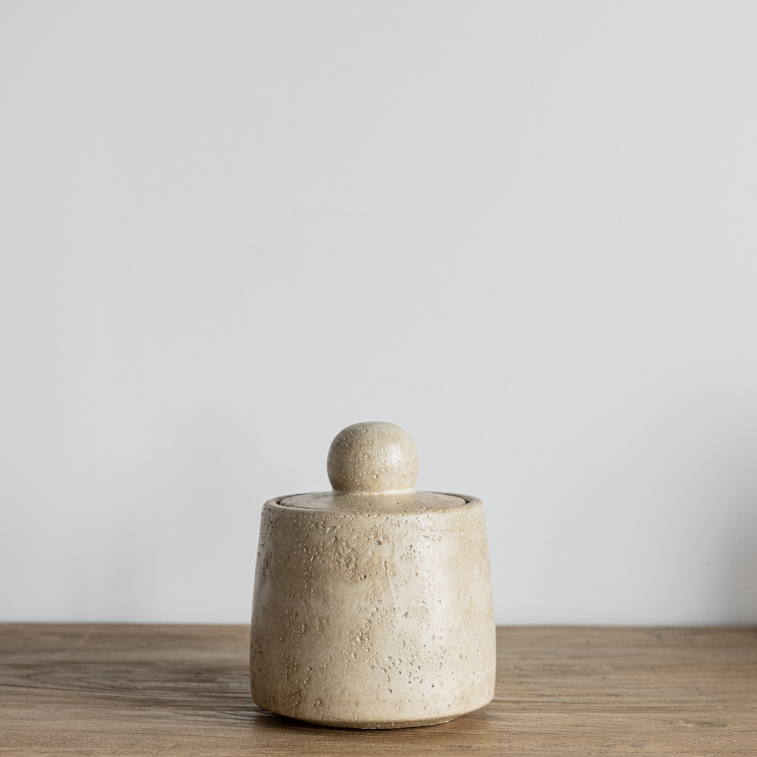 Beige travertine cement canister decorative object by Luxe B Co, featuring smooth textured surface and modern design.