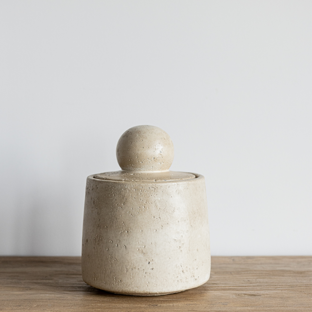 Beige travertine cement canister decorative object by Luxe B Co, featuring smooth textured surface and modern design.