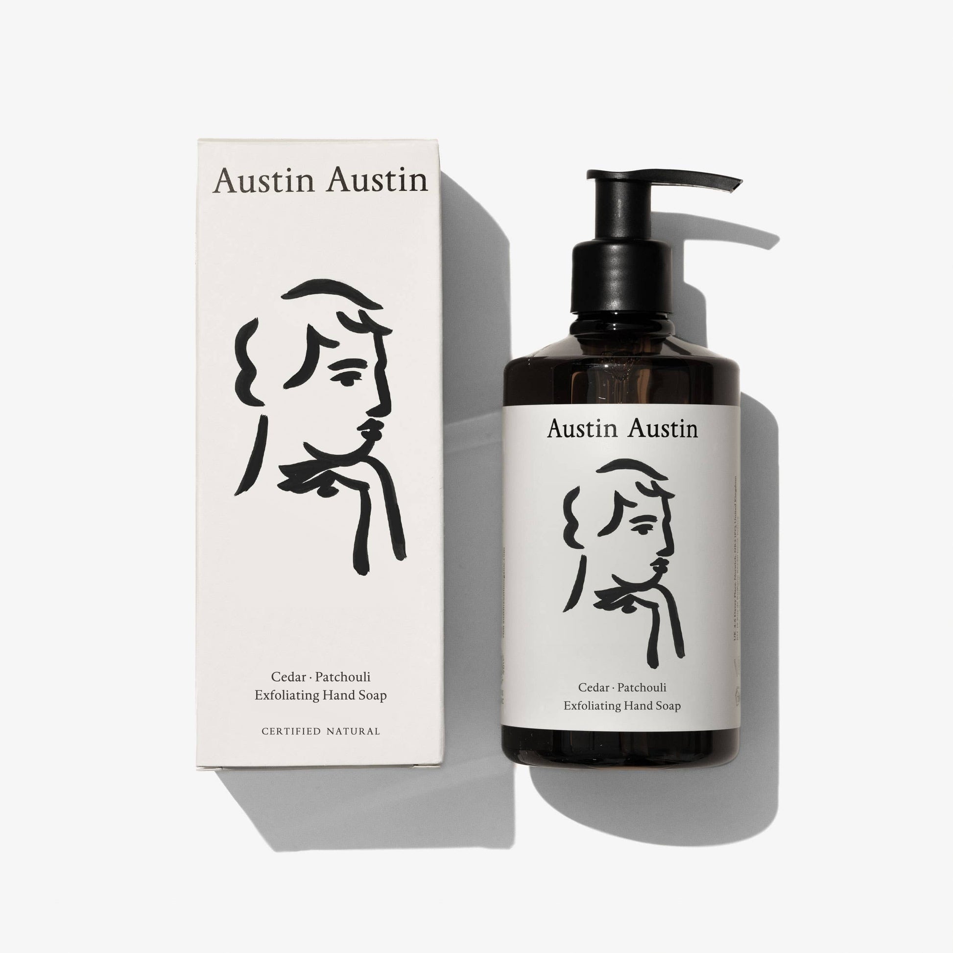 Austin Austin Cedar & Patchouli Exfoliating Hand Soap with natural cedarwood and patchouli scents, featuring exfoliating particles.