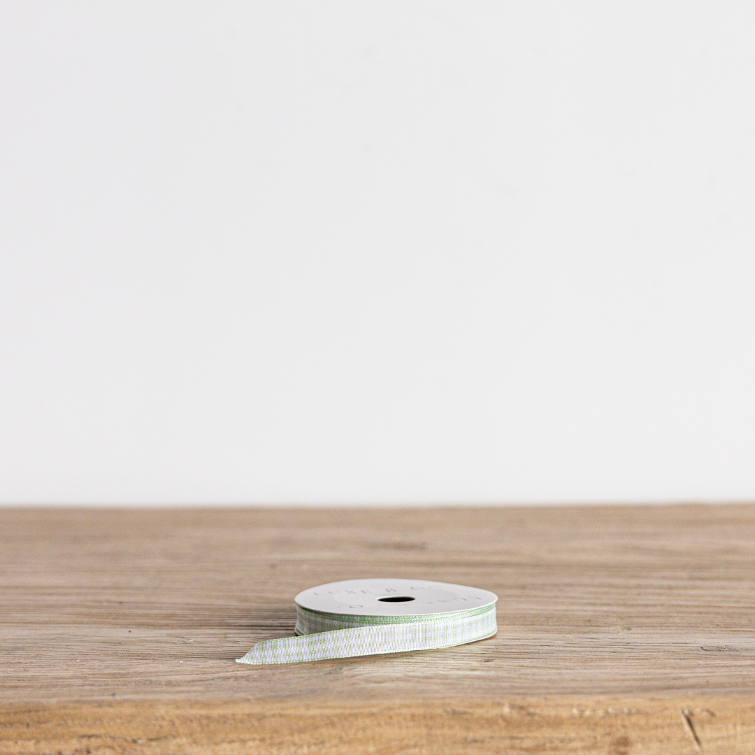 Spring green gingham ribbon by Luxe B Co, showcasing a classic plaid pattern ideal for crafts and decorations.