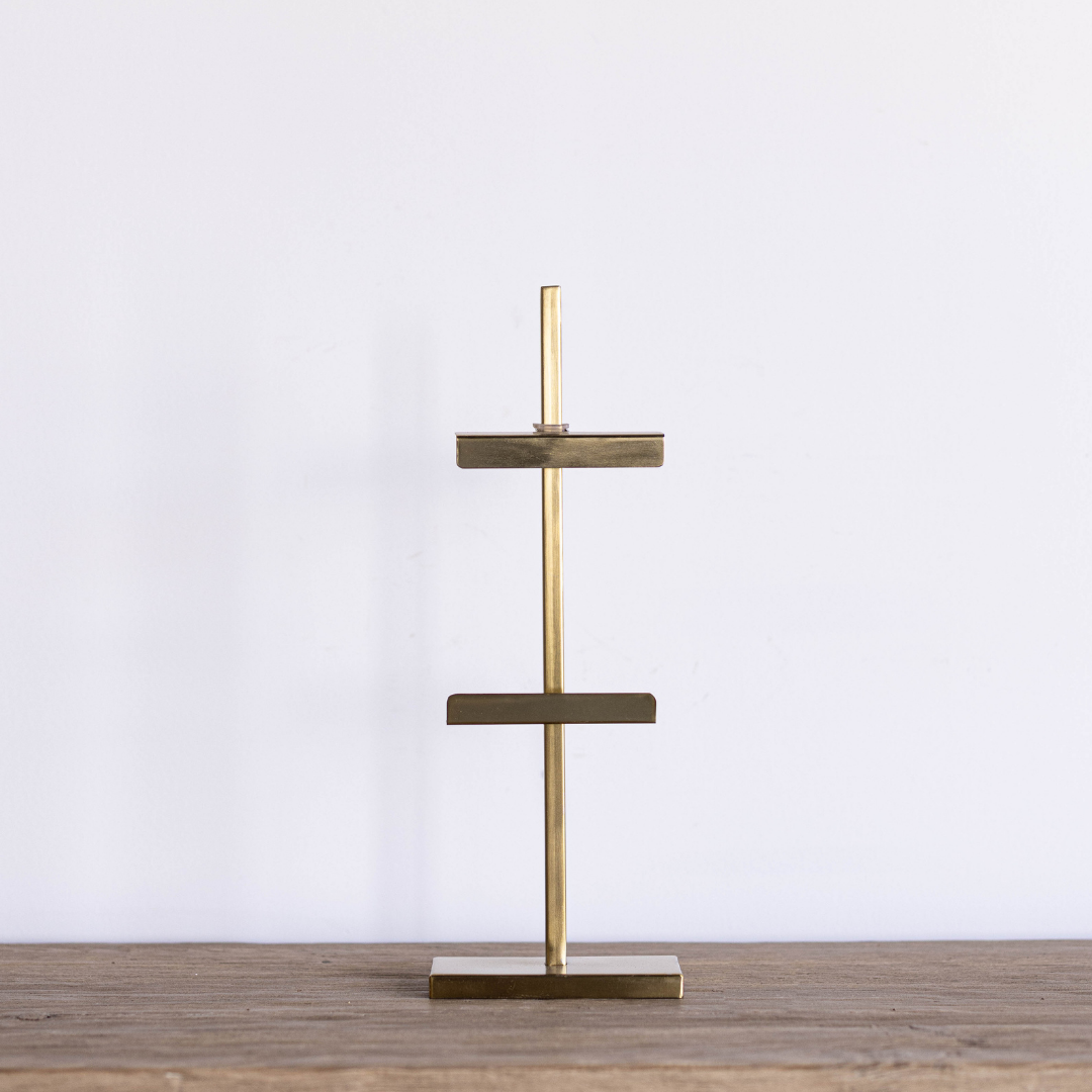Gold adjustable art easel by Luxe B Co, showcasing a sturdy, sleek design for displaying or working on artwork.