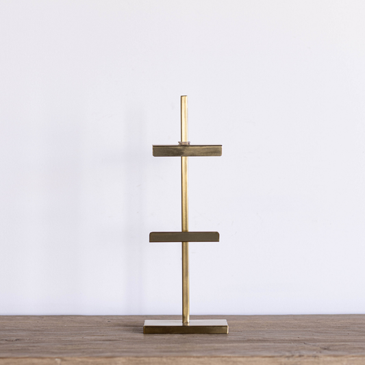 Gold adjustable art easel by Luxe B Co, showcasing a sturdy, sleek design for displaying or working on artwork.