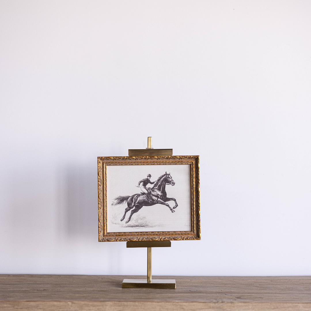 Gold adjustable art easel by Luxe B Co, featuring a sturdy frame and versatile height for painting and display.