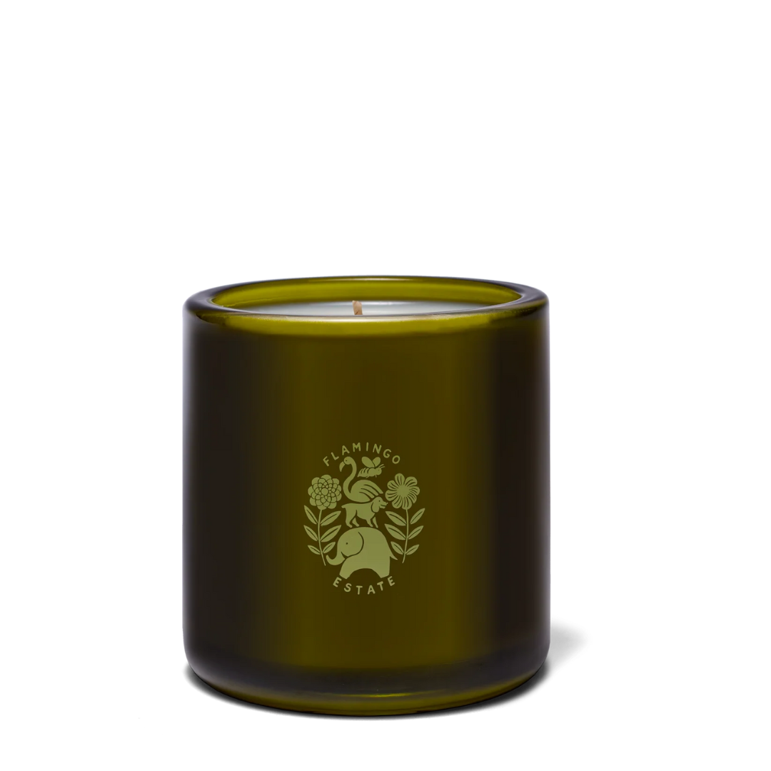 Green Goddess candle by Luxe B Co featuring a green glass jar with a white wax interior and a lit wick.
