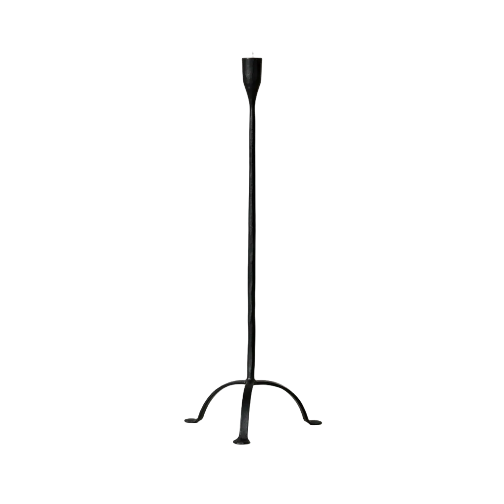 Small hand-forged cast iron candleholder with a footed design, ideal for taper candles from Creative Co-op.