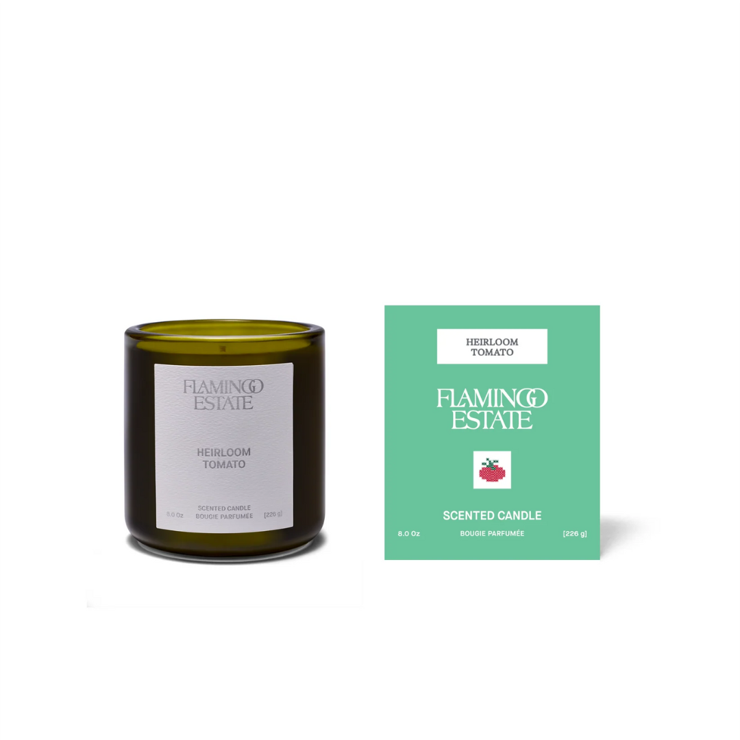 Heirloom Tomato candle by Luxe B Co featuring a realistic tomato-shaped wax candle with detailed green leaves.