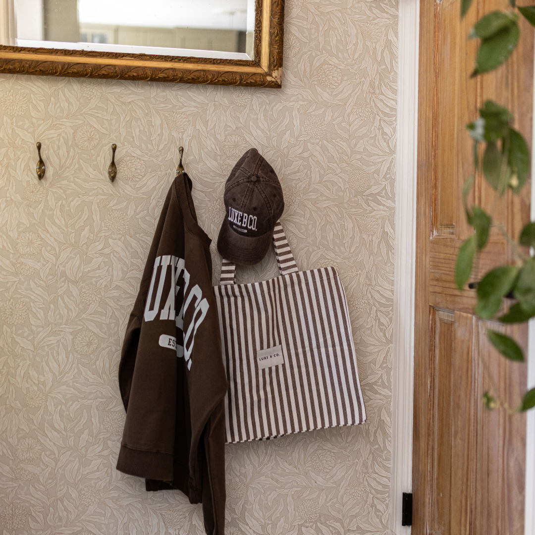 Brown Luxe B Co. pullover sweater with a cozy, relaxed fit, featuring a soft knit fabric and classic design.