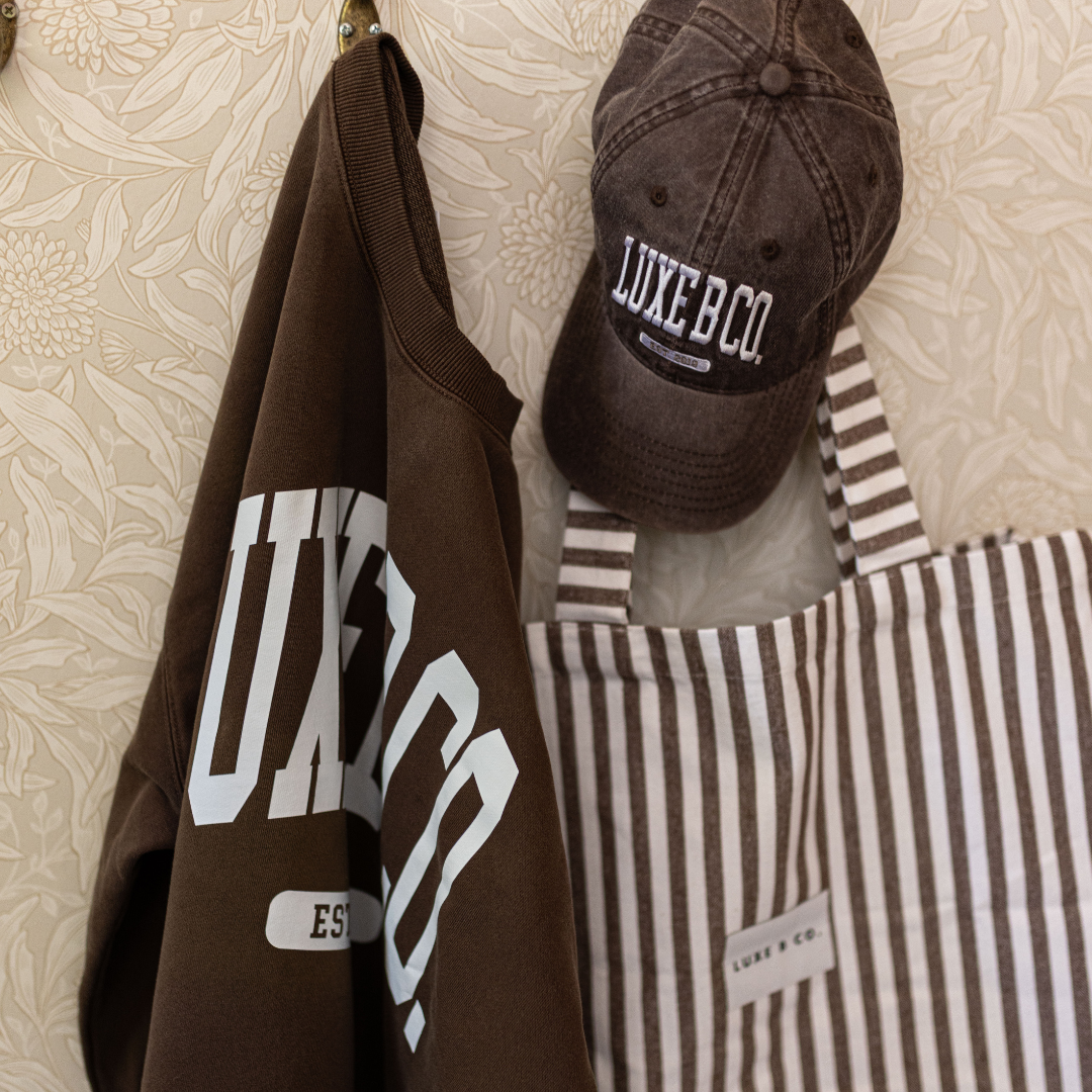 Brown Luxe B Co. pullover sweater featuring a cozy knit design, perfect for casual and stylish winter wear.