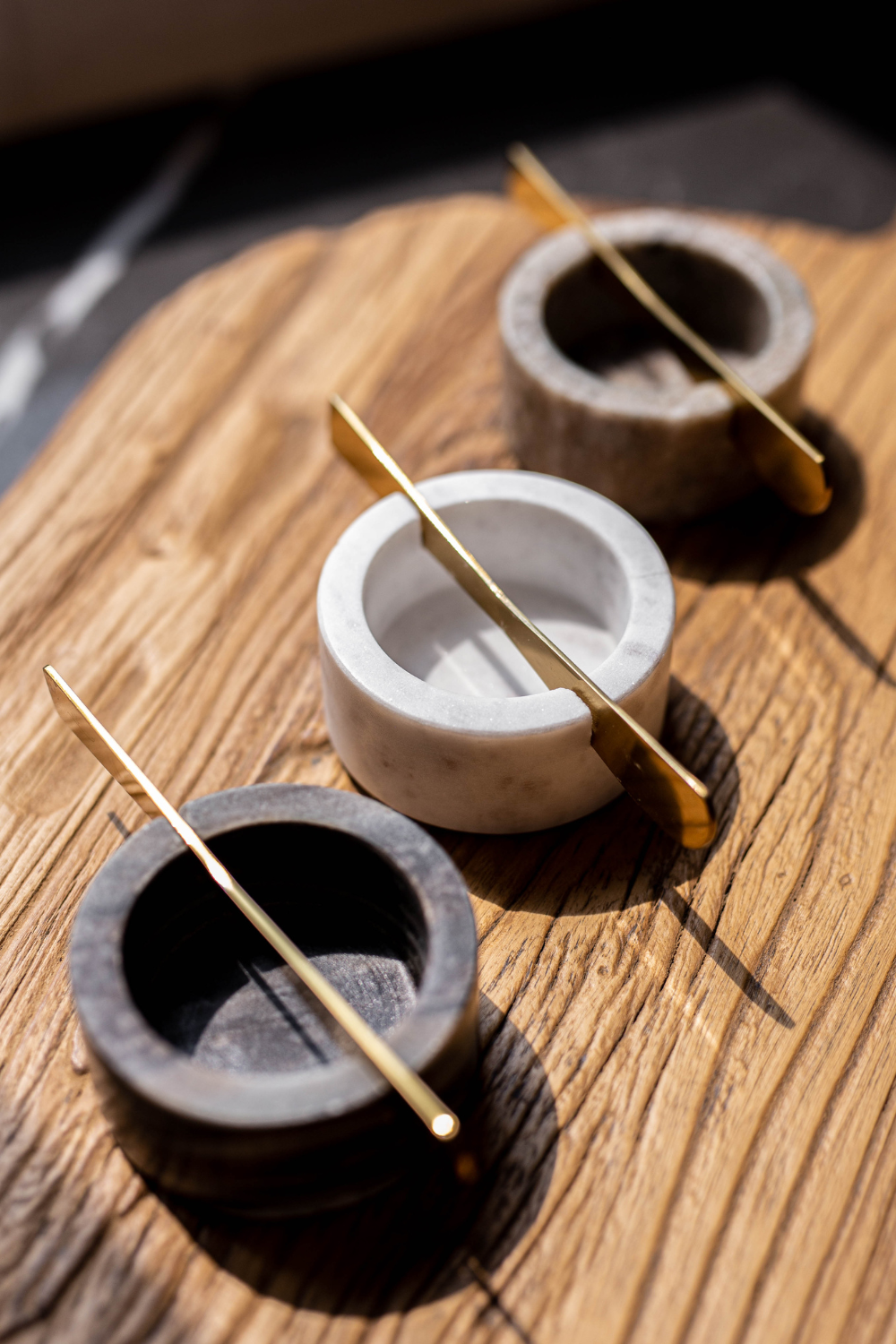 Marble charcuterie dish with a matching knife, designed for serving meats, cheeses, and snacks, by Luxe B Co.