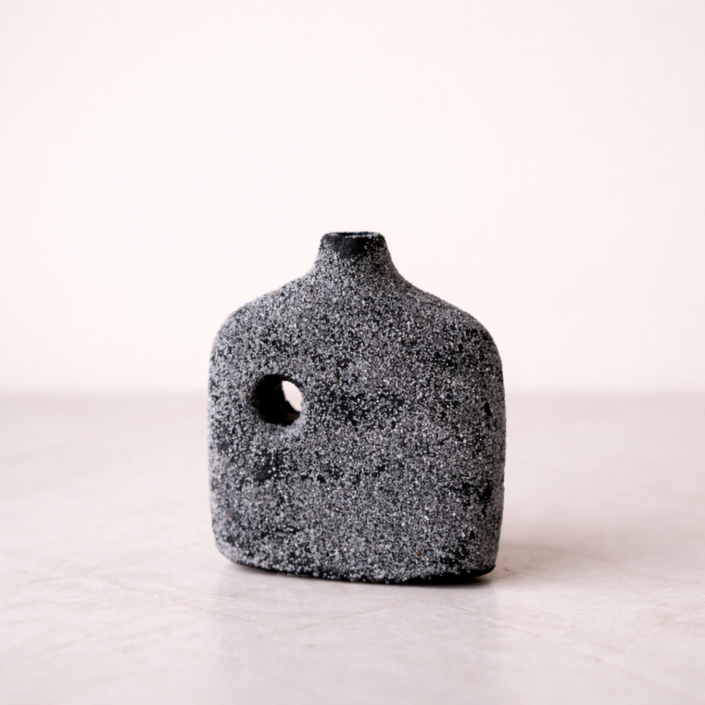 Black terracotta Milos Vase by Luxe B Co with a smooth, rounded shape and matte finish, perfect for modern home decor.