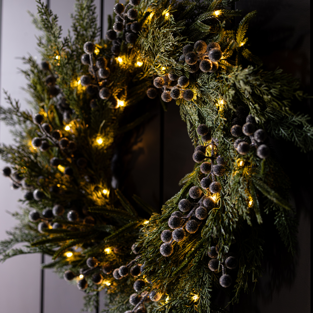 Navy plum frosted berry Norfolk cypress real touch wreath, 24-inch decorative wreath by Luxe B Co with frosted accents and natural-looking foliage.