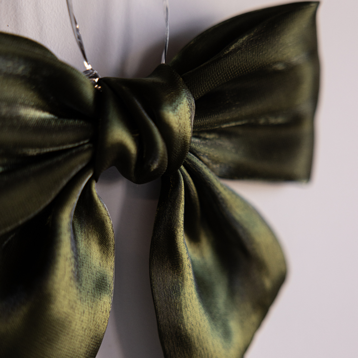 Set of three olive green gauze bows by Luxe B Co, featuring soft, lightweight fabric and elegant bow shapes for accessories.