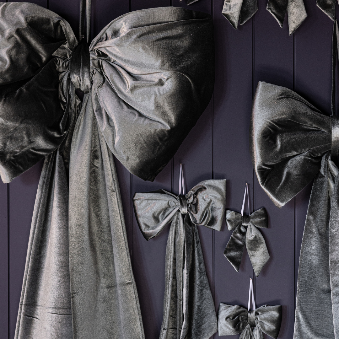 Large sage velvet bow by Luxe B Co, featuring soft fabric and elegant oversized design, perfect for accessories or decorations.
