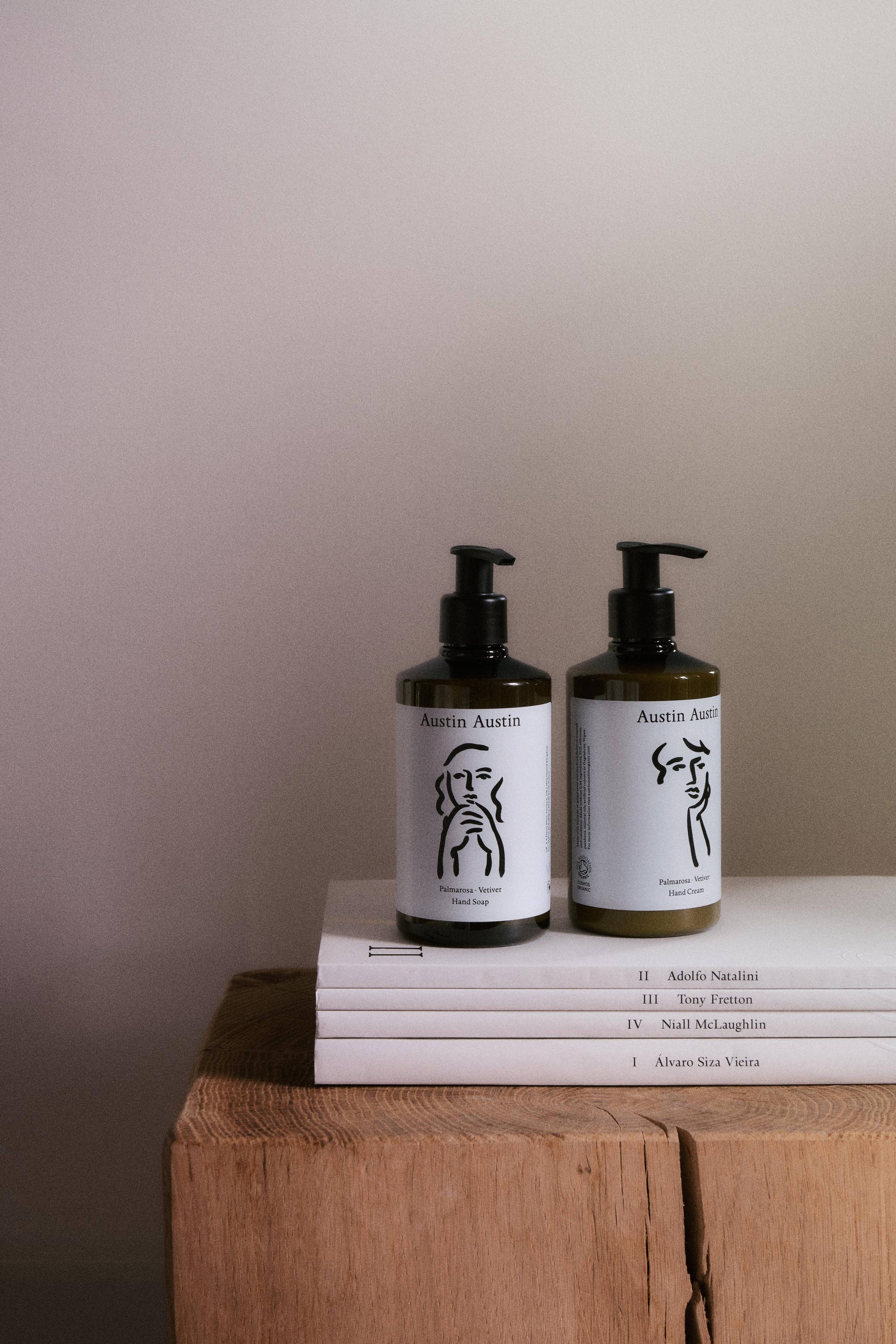 Austin Austin Palmarosa and Vetiver Hand Soap in a clear pump bottle with a natural, botanical label.