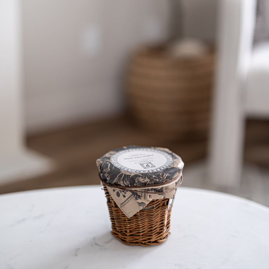 Woven candle from Porch View Home by Luxe B Co, featuring a cozy candle with woven design in a warm, inviting setting.