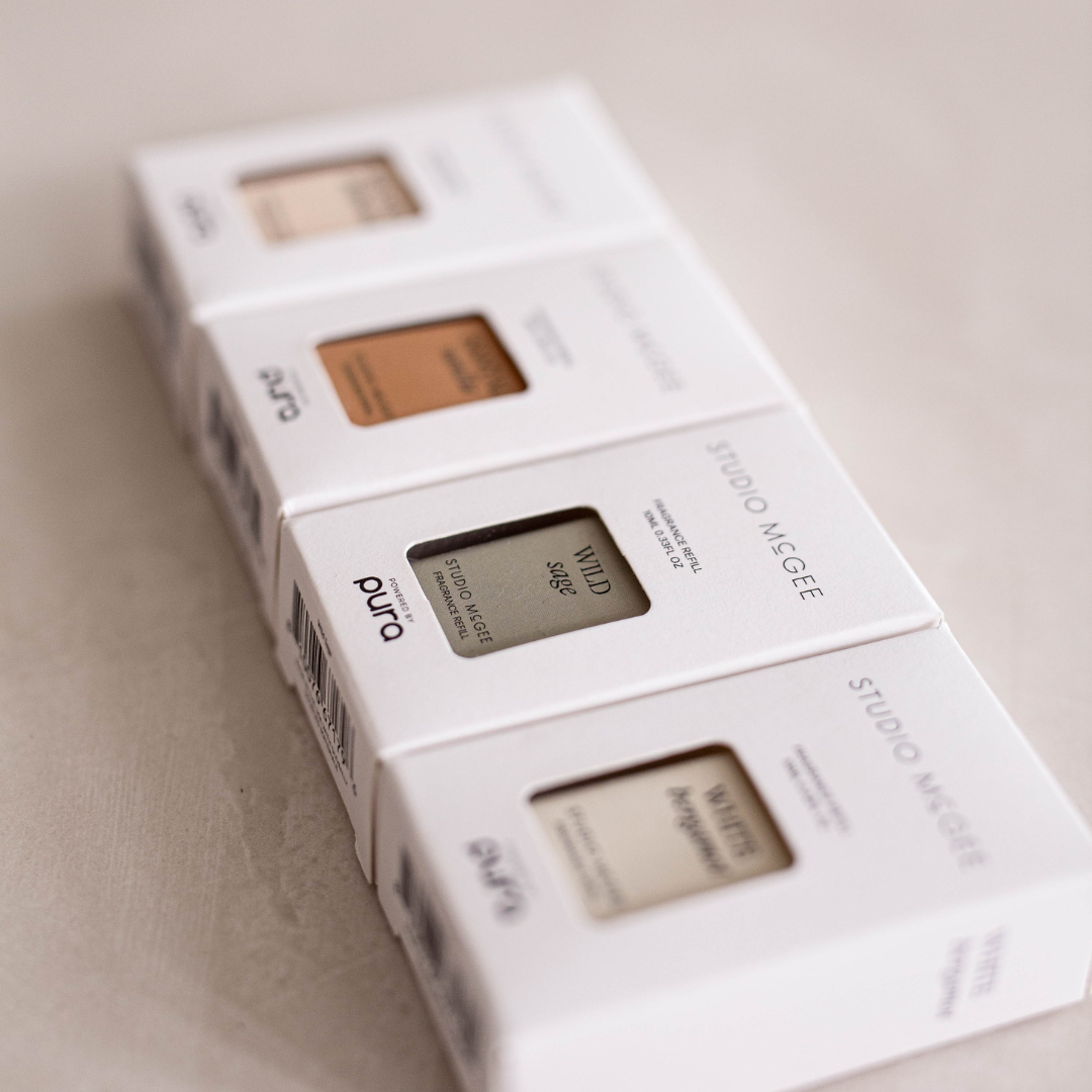 Luxe B Co Pura x Studio McGee Santal Vanilla home fragrance refill with vanilla and warm spice scent in a sleek bottle.
