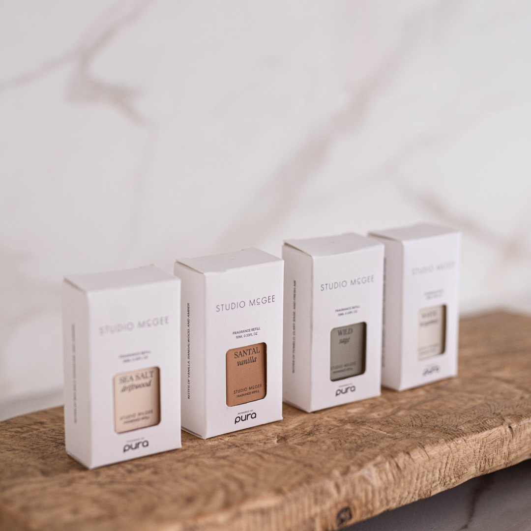 Luxe B Co Pura x Studio McGee Santal Vanilla home fragrance refill in a sleek bottle, designed for easy scent renewal.