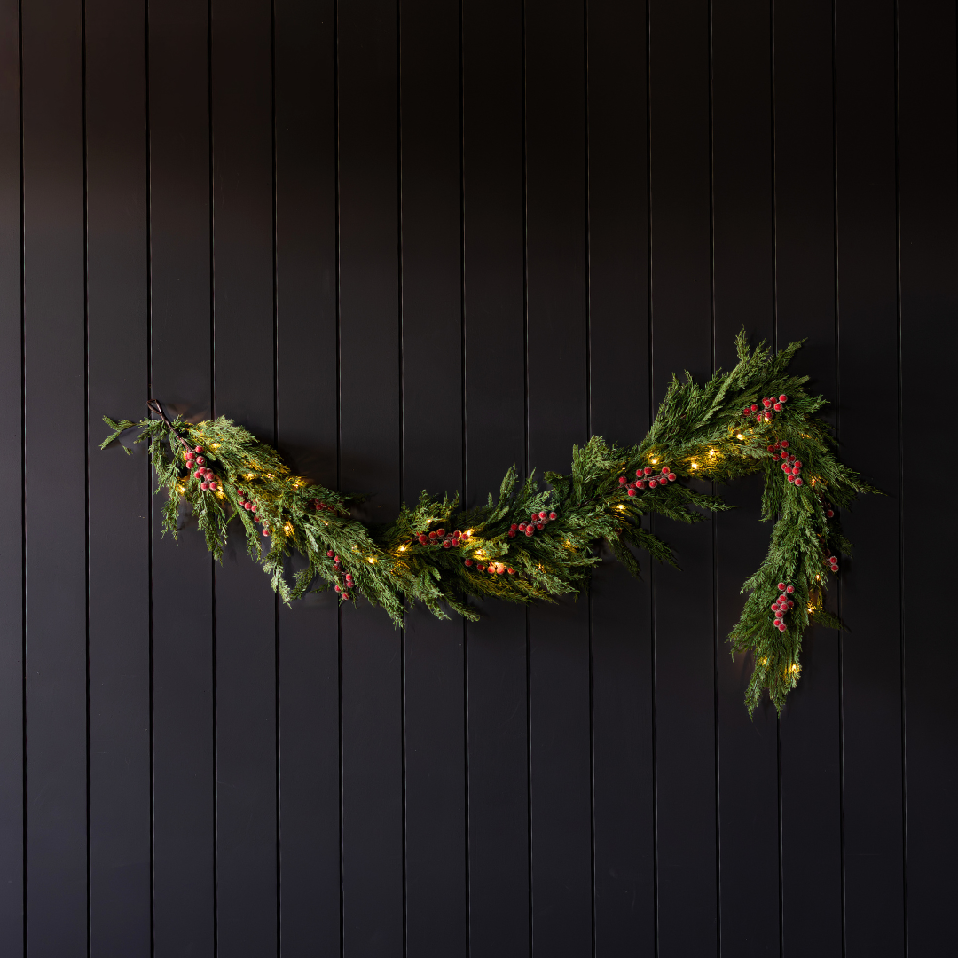 Six-foot red plum frosted berry Norfolk cypress Christmas garland by Luxe B Co with realistic touch foliage.