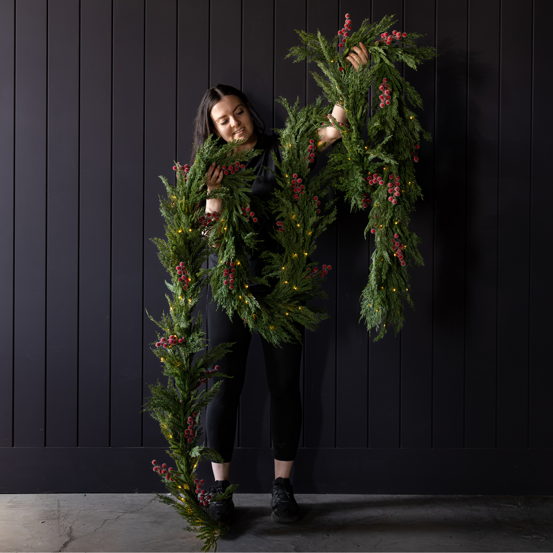 15-foot Red Plum Frosted Berry Norfolk Cypress Christmas garland with realistic touch leaves and berries, ideal for holiday decorations.