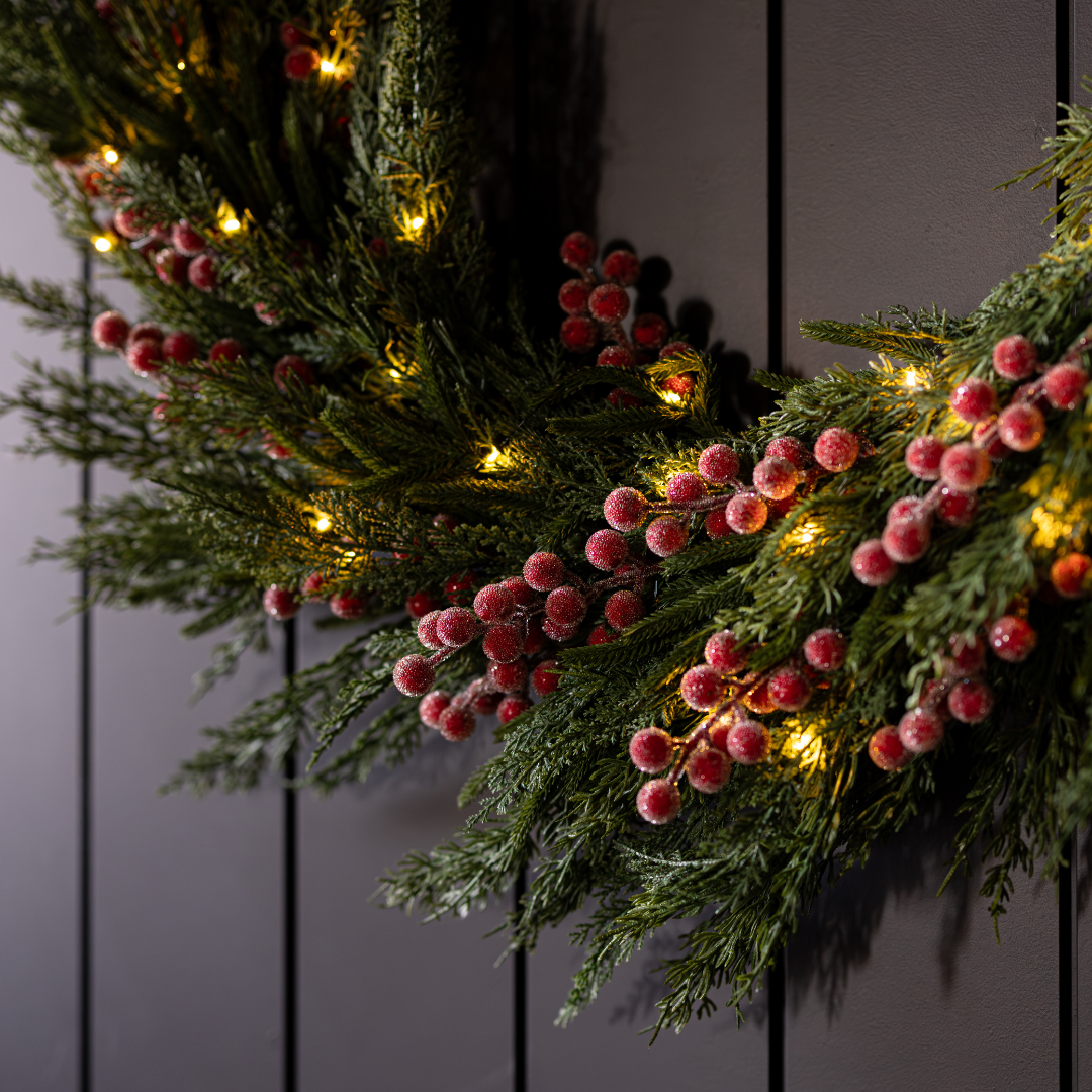 Red plum and frosted berry Norfolk cypress real touch wreath, 34-inch Luxe B Co decorative floral arrangement.