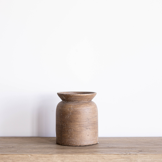 Terracotta brown etched vase by PD HOME with intricate carved patterns, ideal for decorative floral arrangements.
