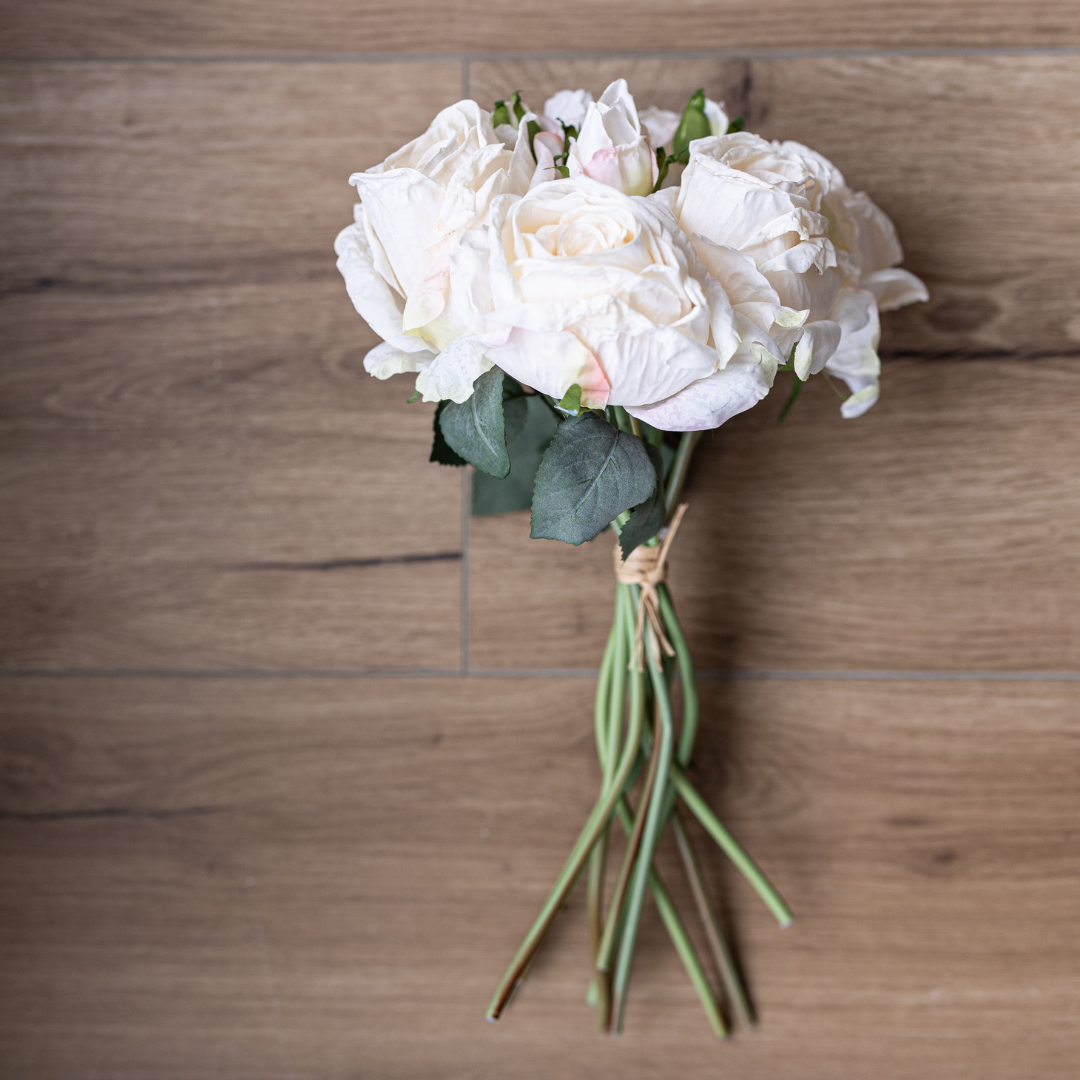 White faux rose bunch from Luxe B Co, lush greenery bouquet of realistic white roses for garden-inspired decor.