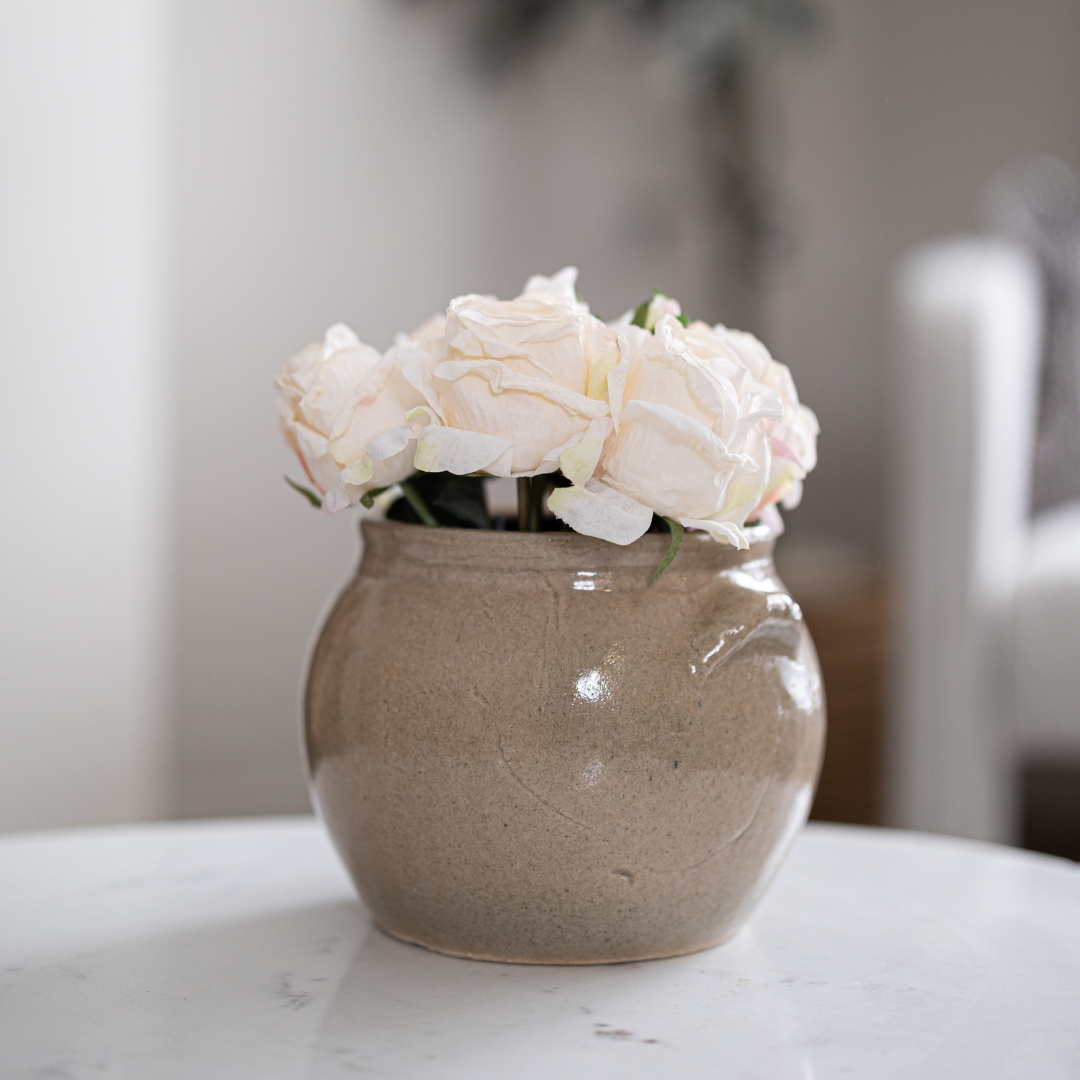 White garden faux rose bunch by Luxe B Co, showcasing realistic white silk roses and lush greenery in a natural arrangement.