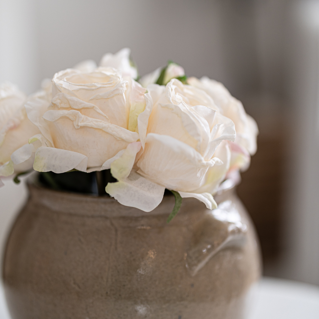 White faux rose bunch from Luxe B Co, lush greenery arrangement for garden-inspired decor, realistic artificial flower display.