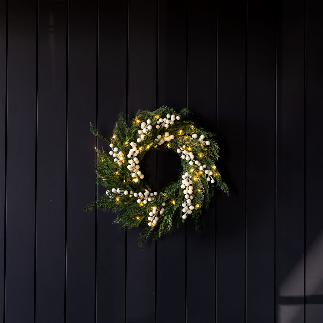 White Plum Frosted Berry and Norfolk Cypress Real Touch Wreath, 24-inch, showcasing white plum and frosted berries on lush greenery.