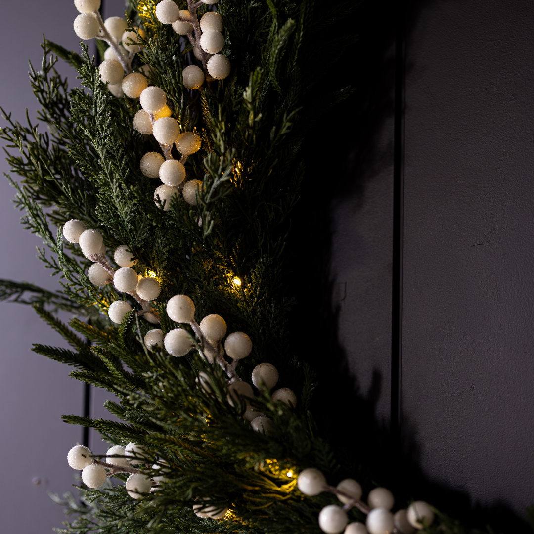White Plum Frosted Berry Norfolk Cypress real touch wreath, 24-inch, with white plum, frosted berries, and Norfolk cypress branches.