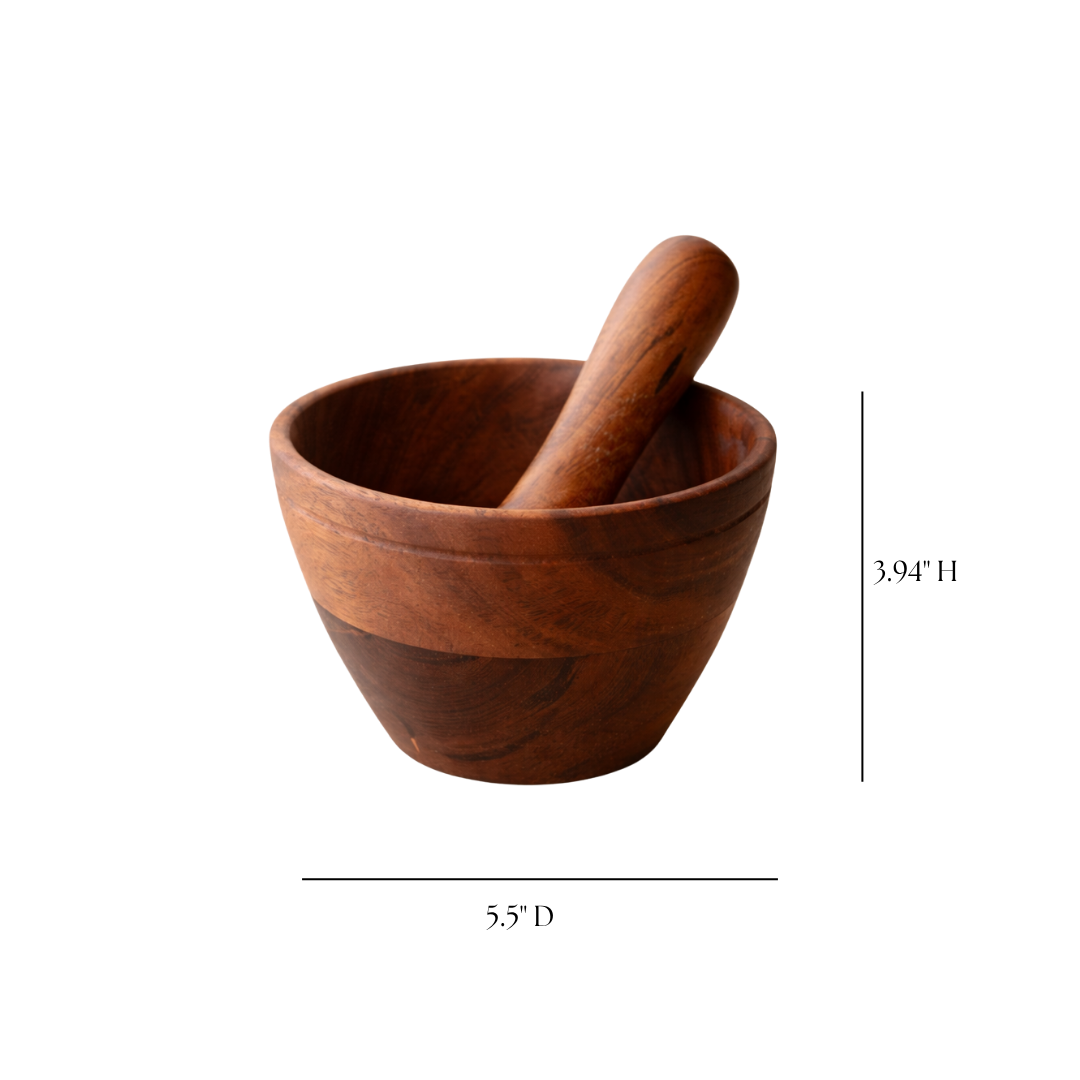 Wooden mortar and pestle from Luxe B Co, handcrafted kitchen tool for grinding spices and herbs, natural wood finish.