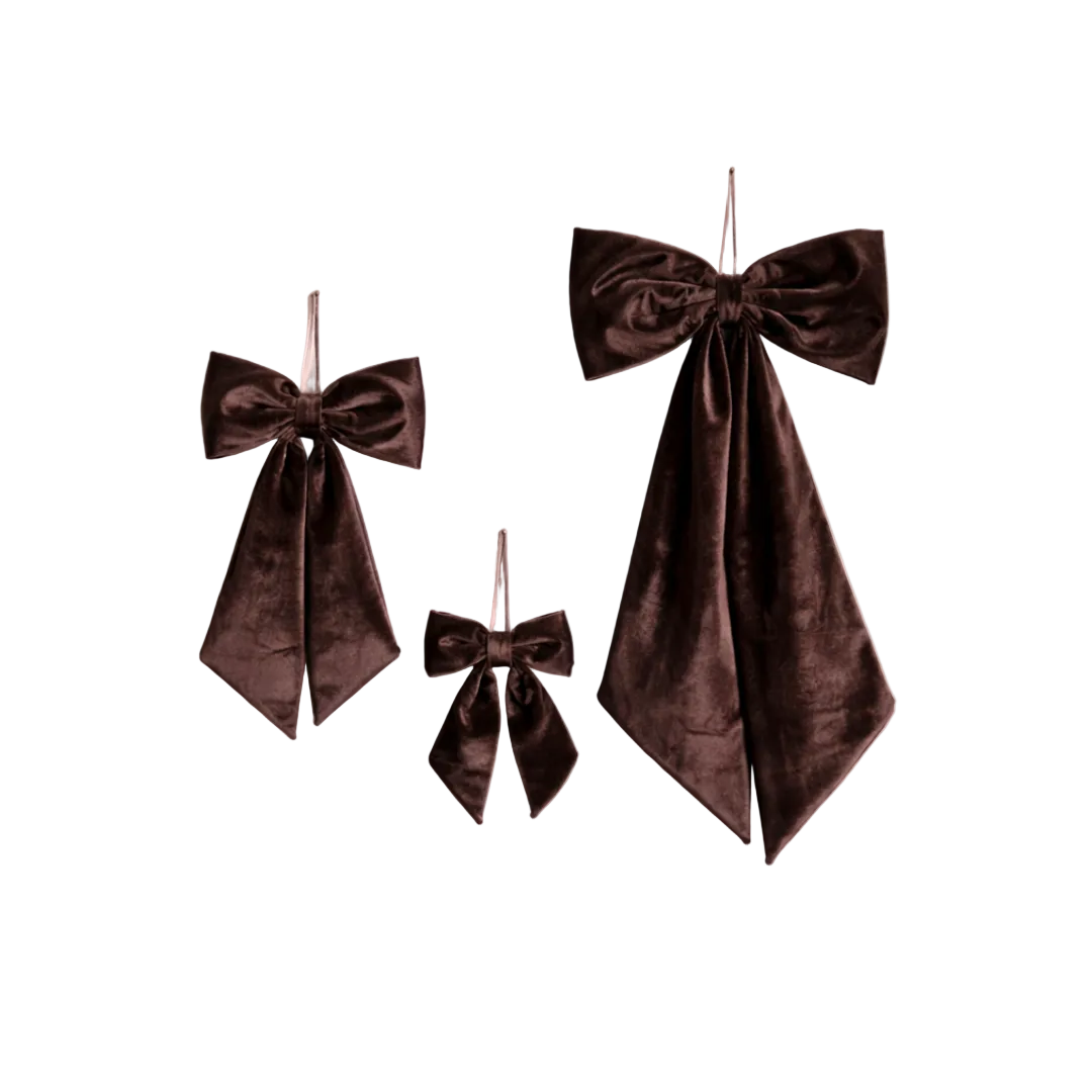 Close-up of Luxe B Co brown velvet fabric bows showing soft texture and elegant design for hair accessories or gift decoration.