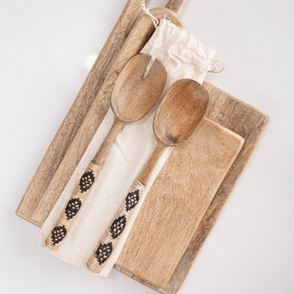 Mango wood salad servers with natural finish, featuring a sleek and sturdy design by Luxe B Co for serving salads.