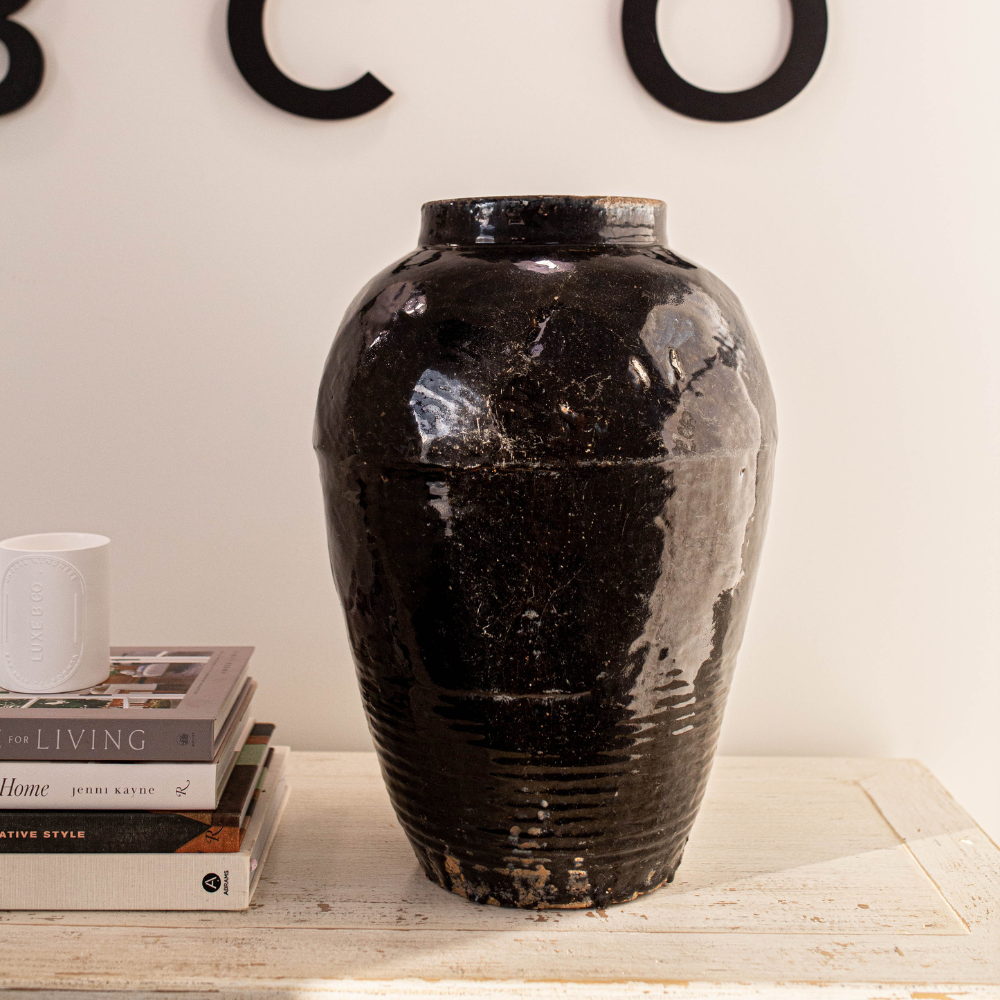 Vintage oversized black Paso vase by Luxe B Co with a sleek, rustic design, perfect for classic home decor.
